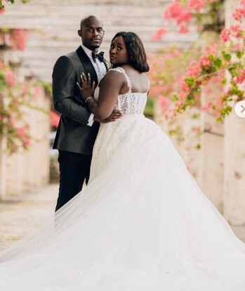 Dennis Gelin with his wife, Danielle Brooks in their wedding dress.